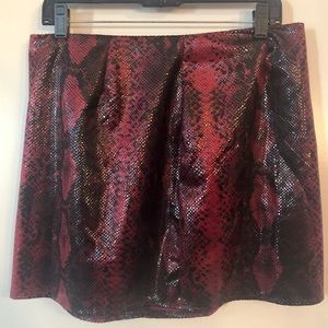 Red “wet look” snake skin print skirt